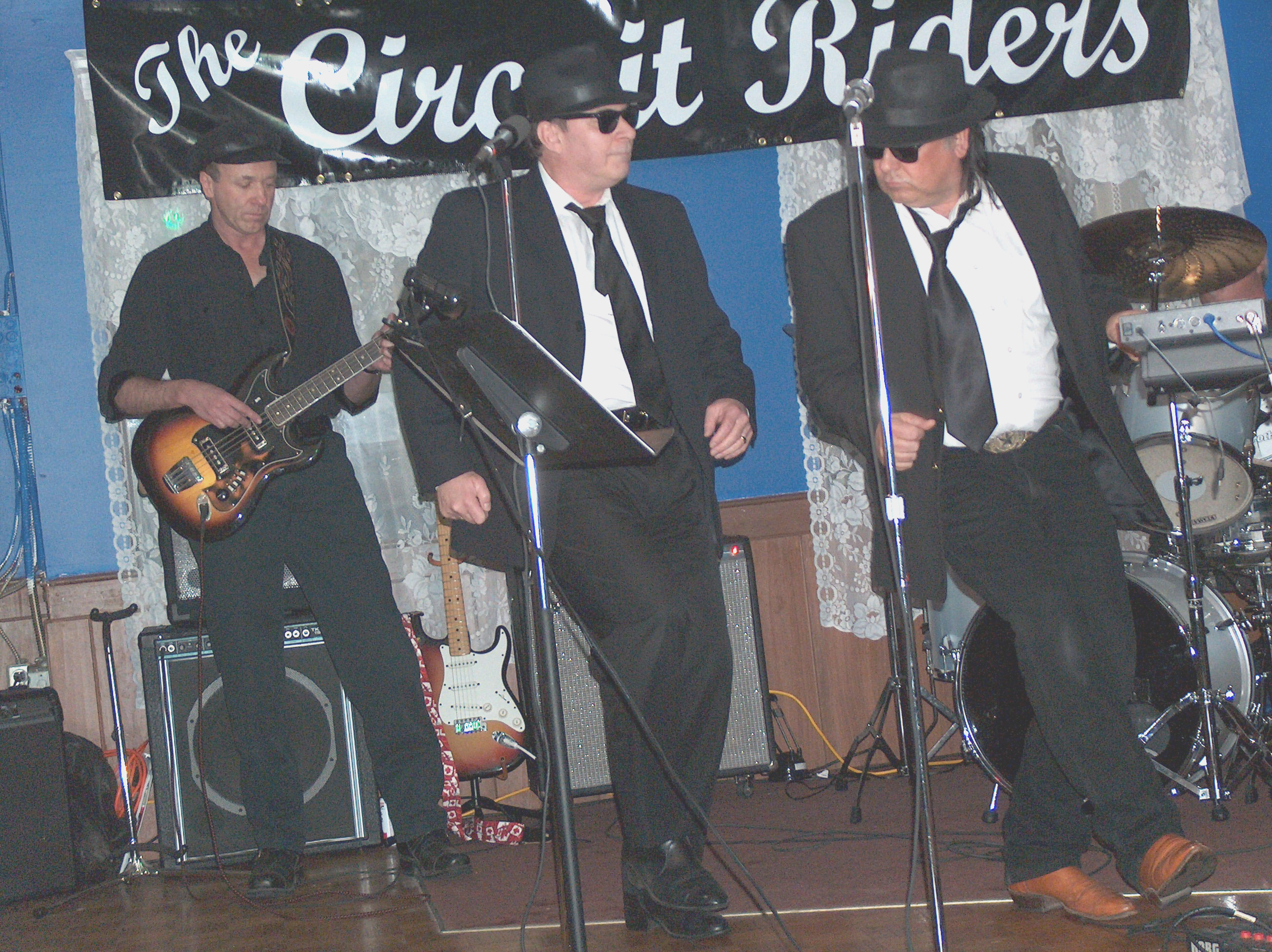 image of Steve and The Circuit Riders Band in Blues Brothers Costumes